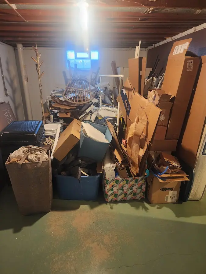 Roll-off dumpster container at job site for Cleanout Dumpster Rental in Belle Isle